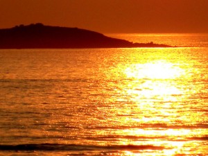 Reflet du coucher de Soleil dans l'océan